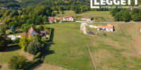 terrain à ST CYPRIEN (24220)