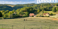 terrain à ST CYPRIEN (24220)