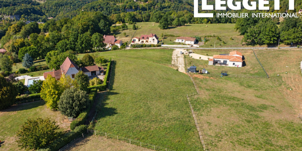 terrain à ST CYPRIEN (24220)